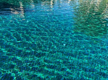 Photo of Clear water with ripples in outdoor swimming pool