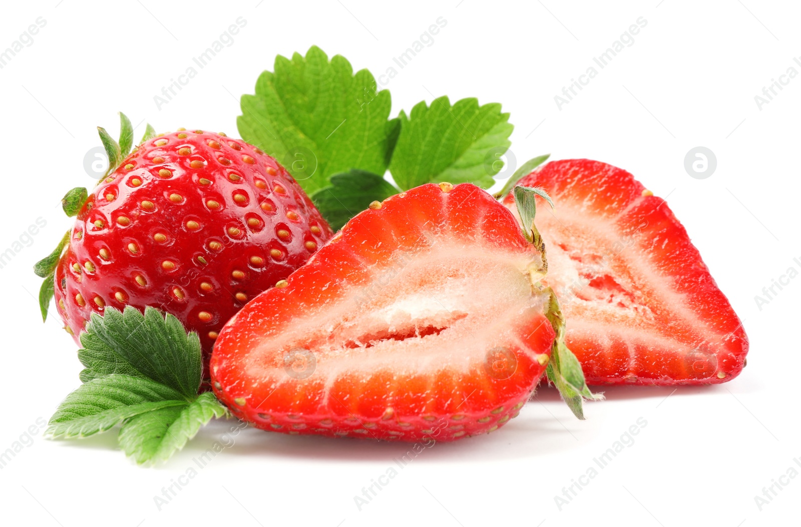 Photo of Delicious whole and cut strawberries with green leaves on white background