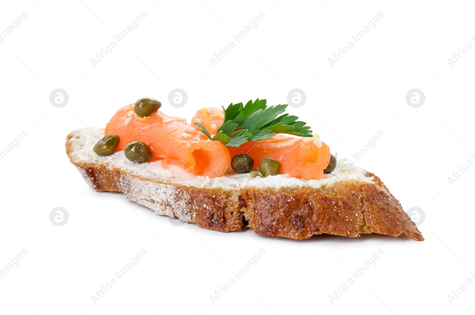 Photo of Tasty canape with salmon, capers and cream cheese isolated on white