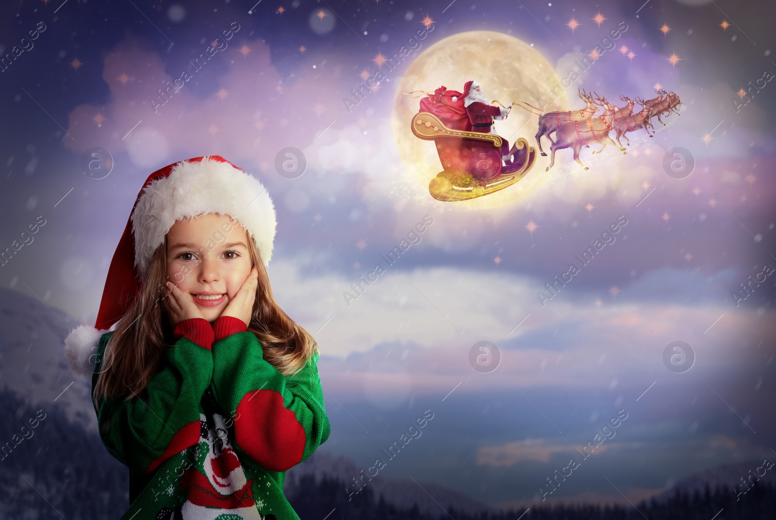Image of Cute little child and Santa Claus flying in his sleigh on background. Christmas celebration