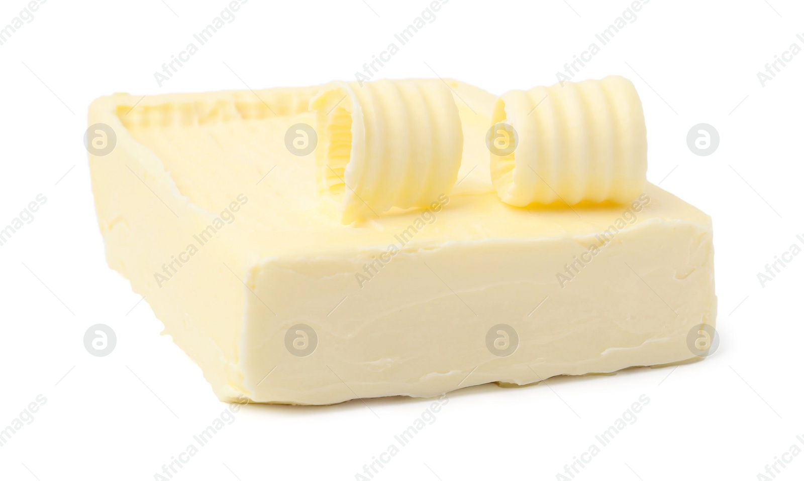 Photo of Tasty butter and curls isolated on white