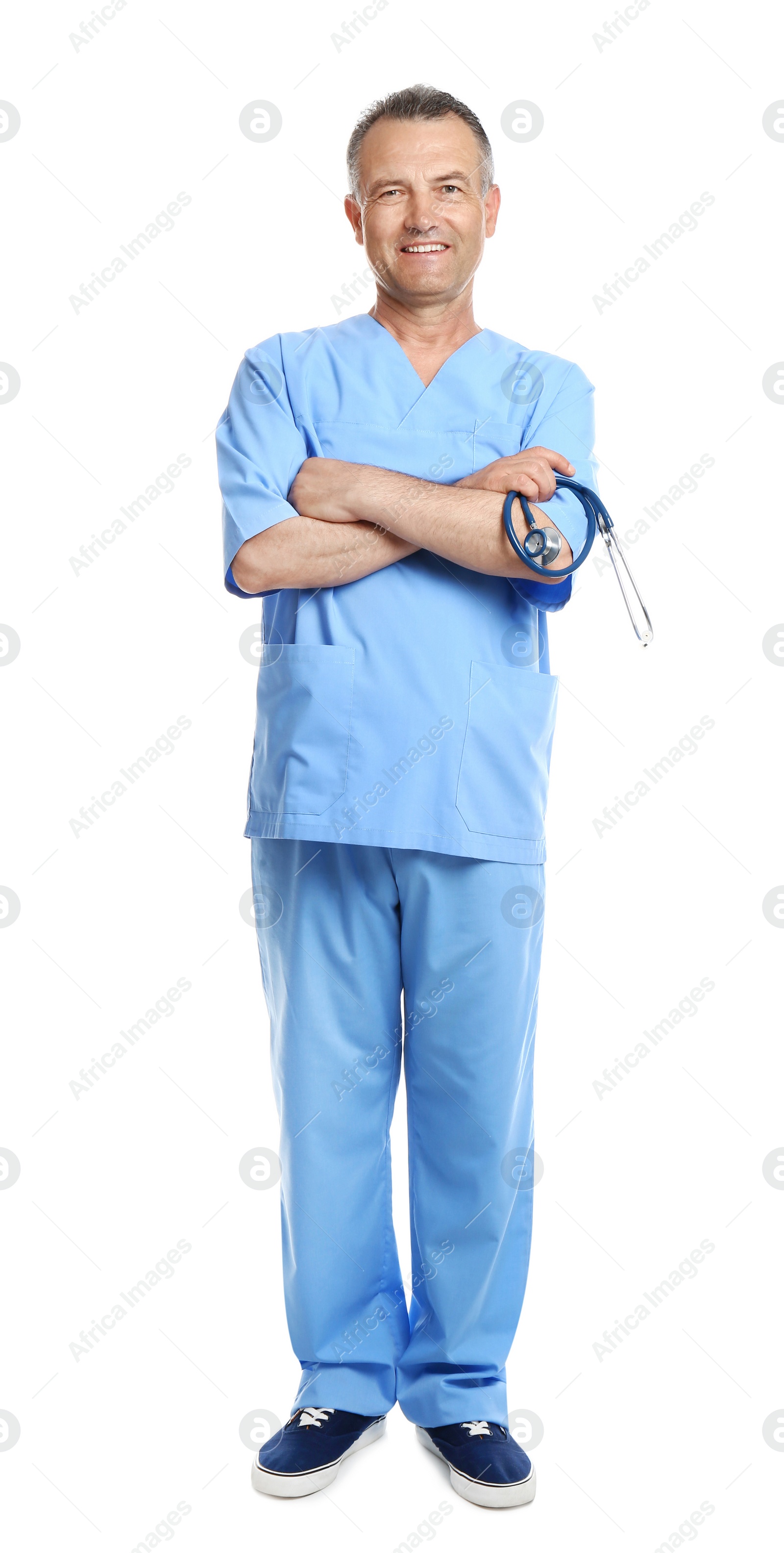 Photo of Full length portrait of experienced doctor in uniform on white background. Medical service