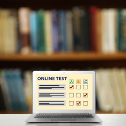 Image of Laptop with online test on screen in library