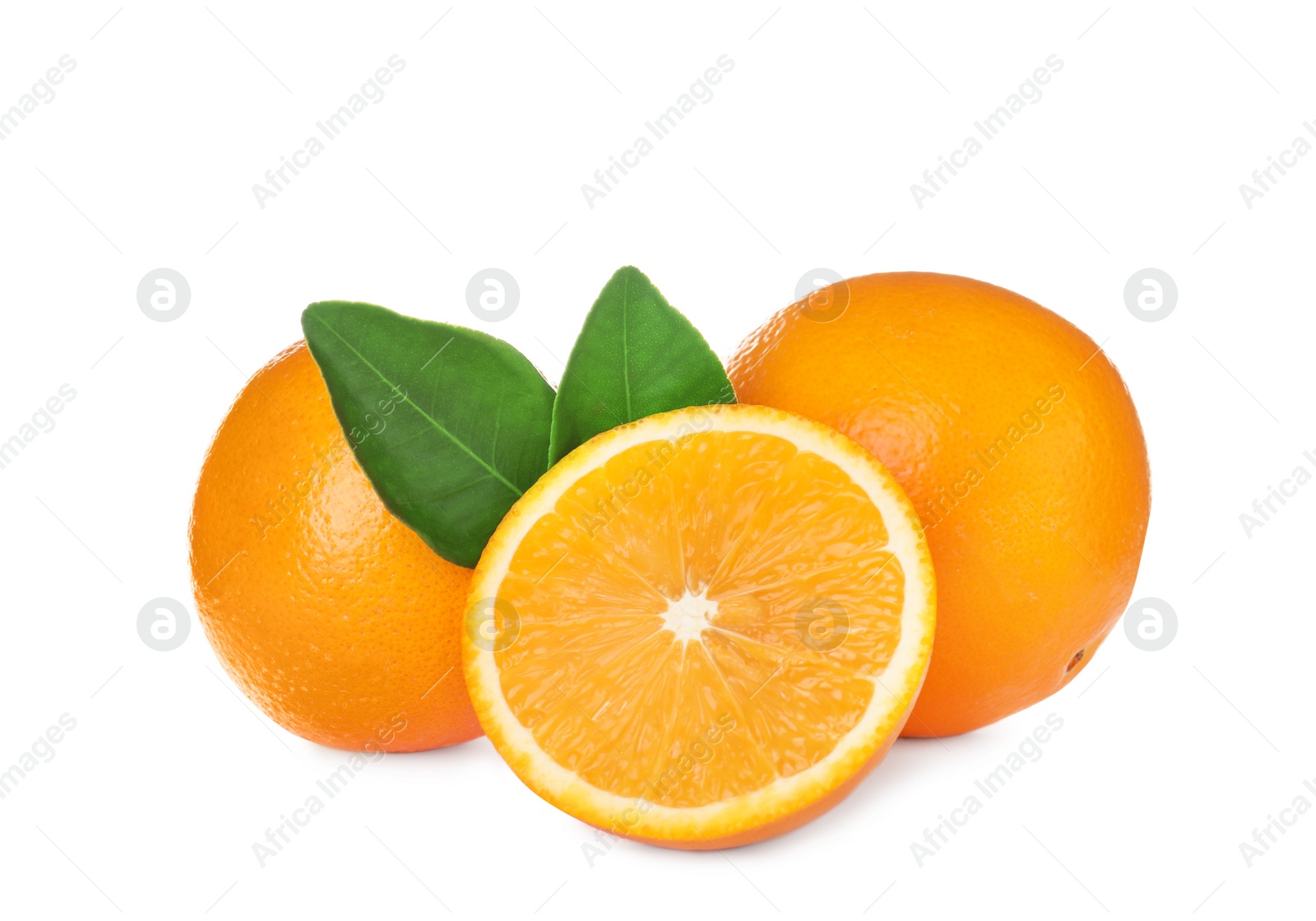 Photo of Fresh ripe oranges with leaves isolated on white