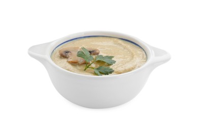 Delicious mushroom cream soup with parsley isolated on white