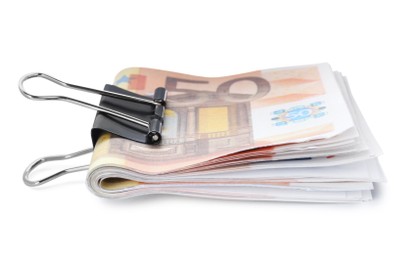 Photo of 50 Euro banknotes with clip isolated on white. Money exchange