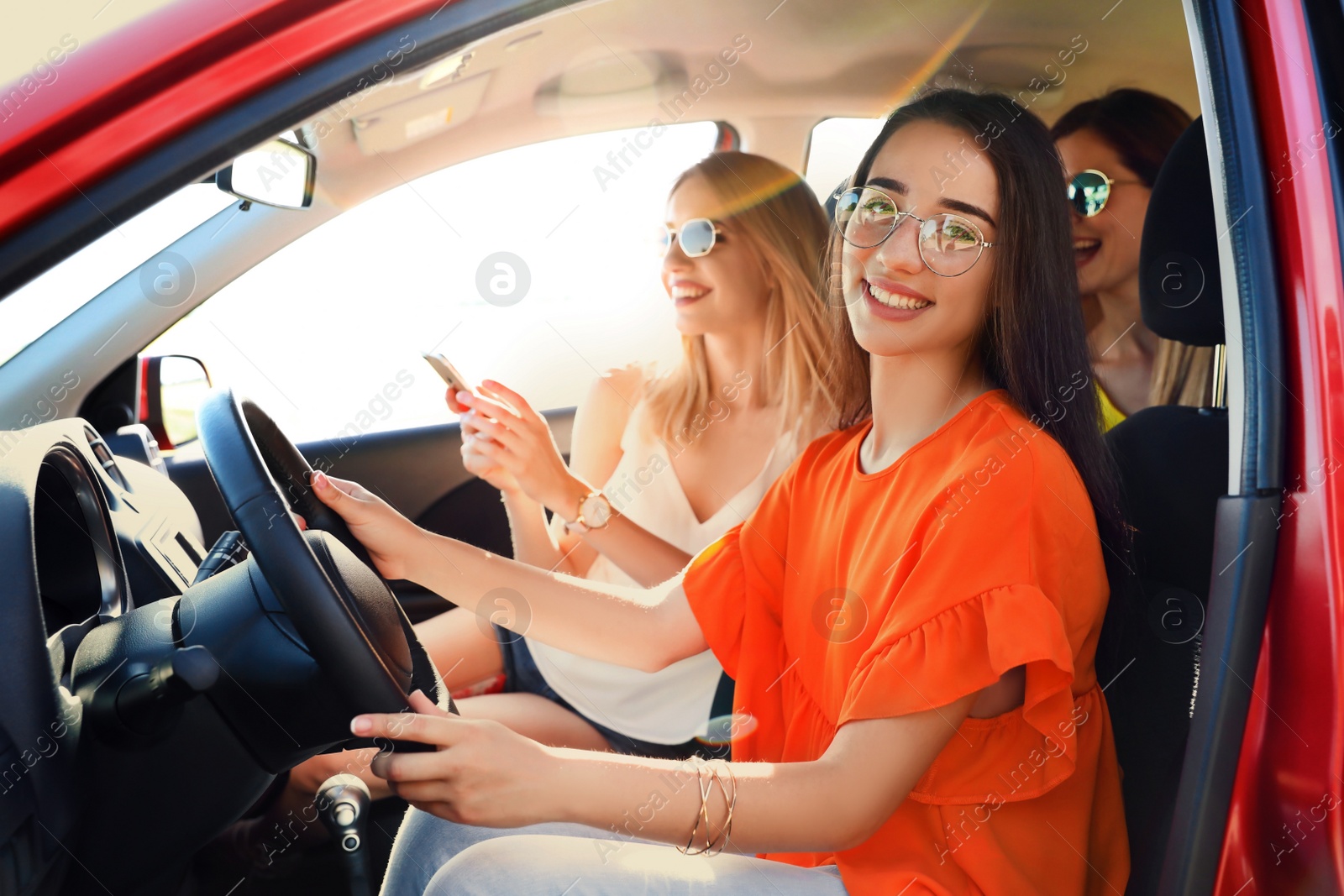 Photo of Happy beautiful young women together in car