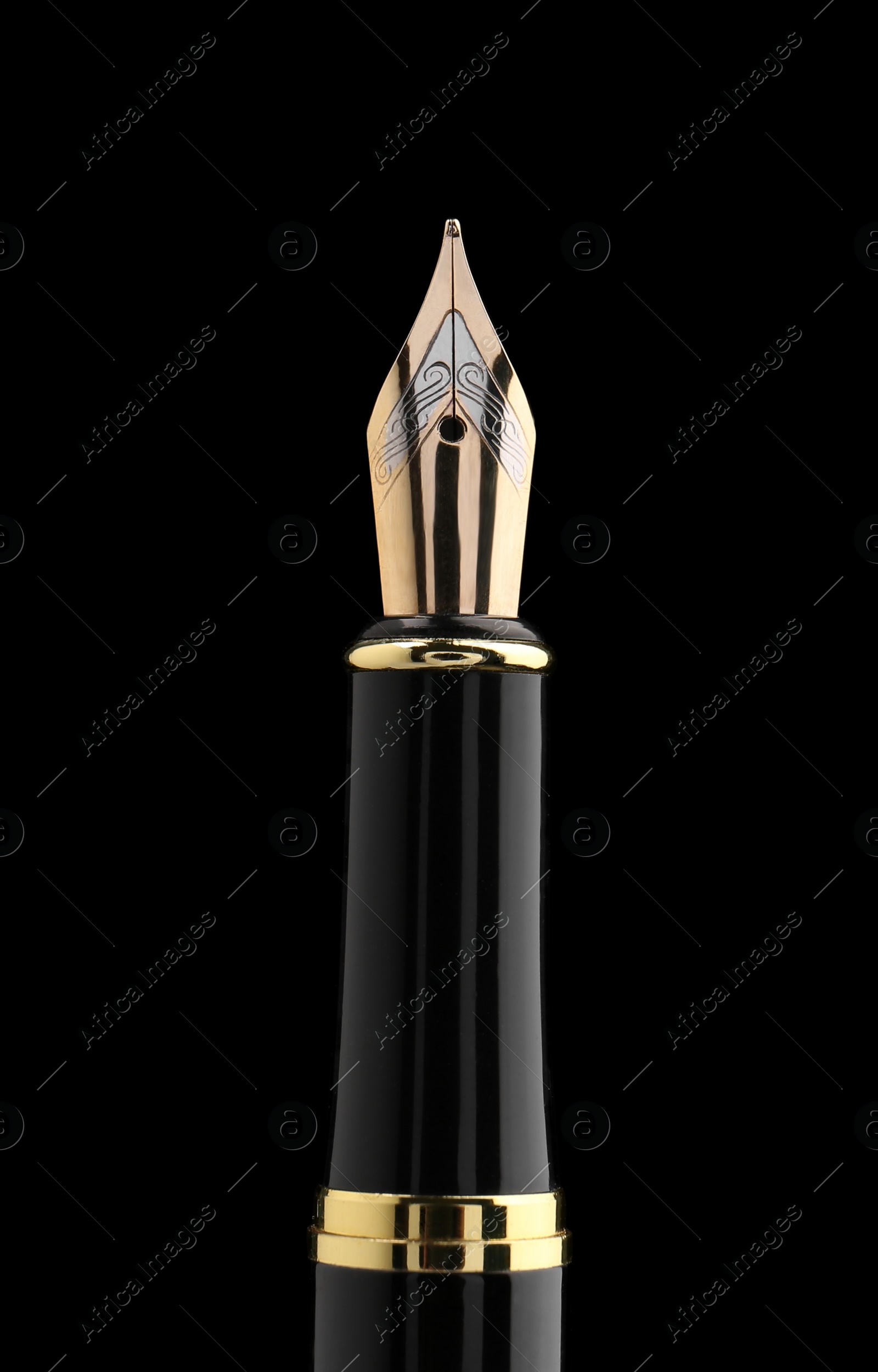 Photo of Beautiful fountain pen with ornate nib on black background