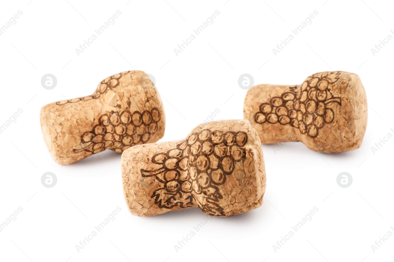 Photo of Sparkling wine corks with grape images on white background