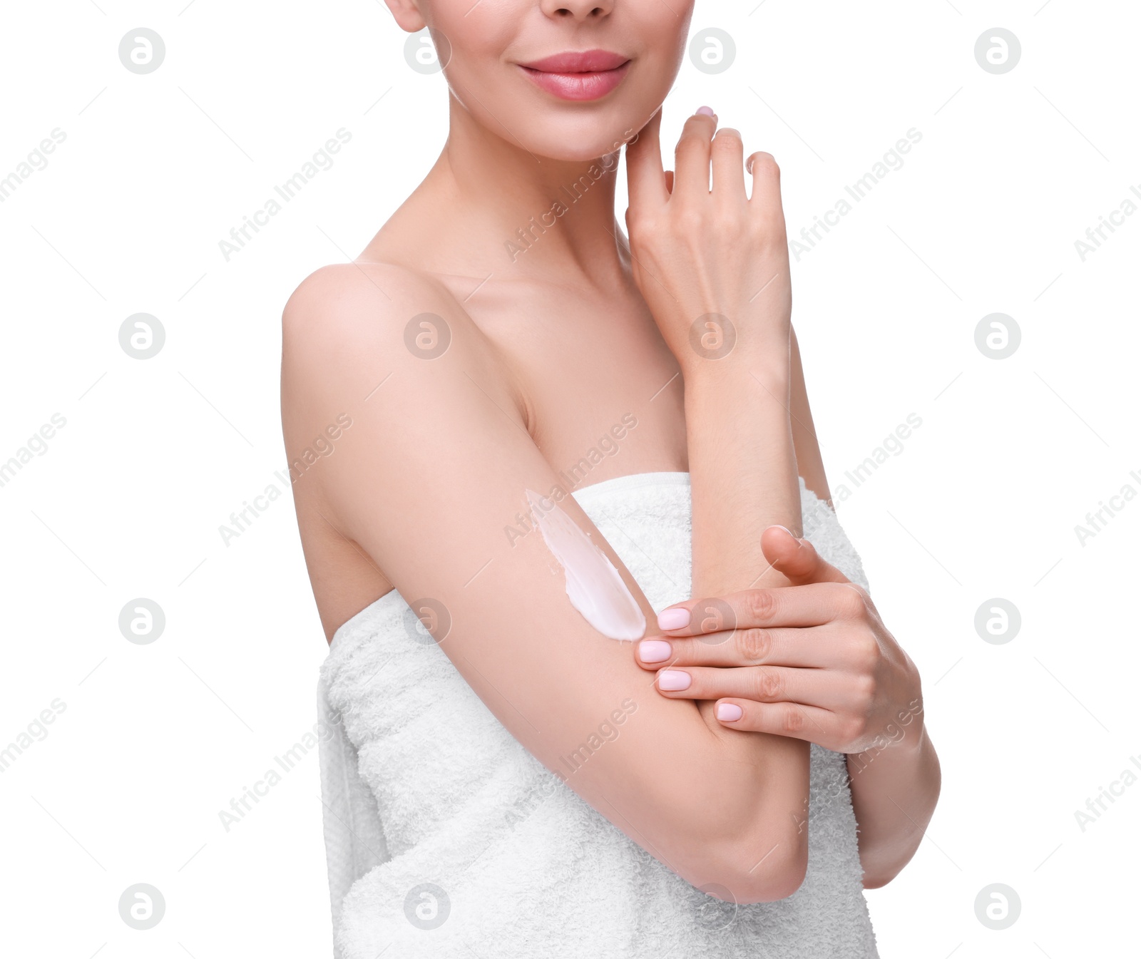 Photo of Woman with smear of body cream on her arm against white background, closeup