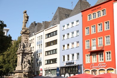 Photo of Cologne, Germany - August 28, 2022: Beautiful residential buildings on city street