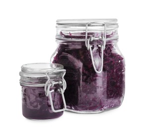 Photo of Jars with tasty red cabbage sauerkraut isolated on white