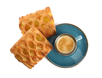 Delicious pastries and coffee on white background, top view