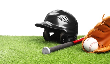 Baseball bat, ball, batting helmet and glove on artificial grass against white background, space for text