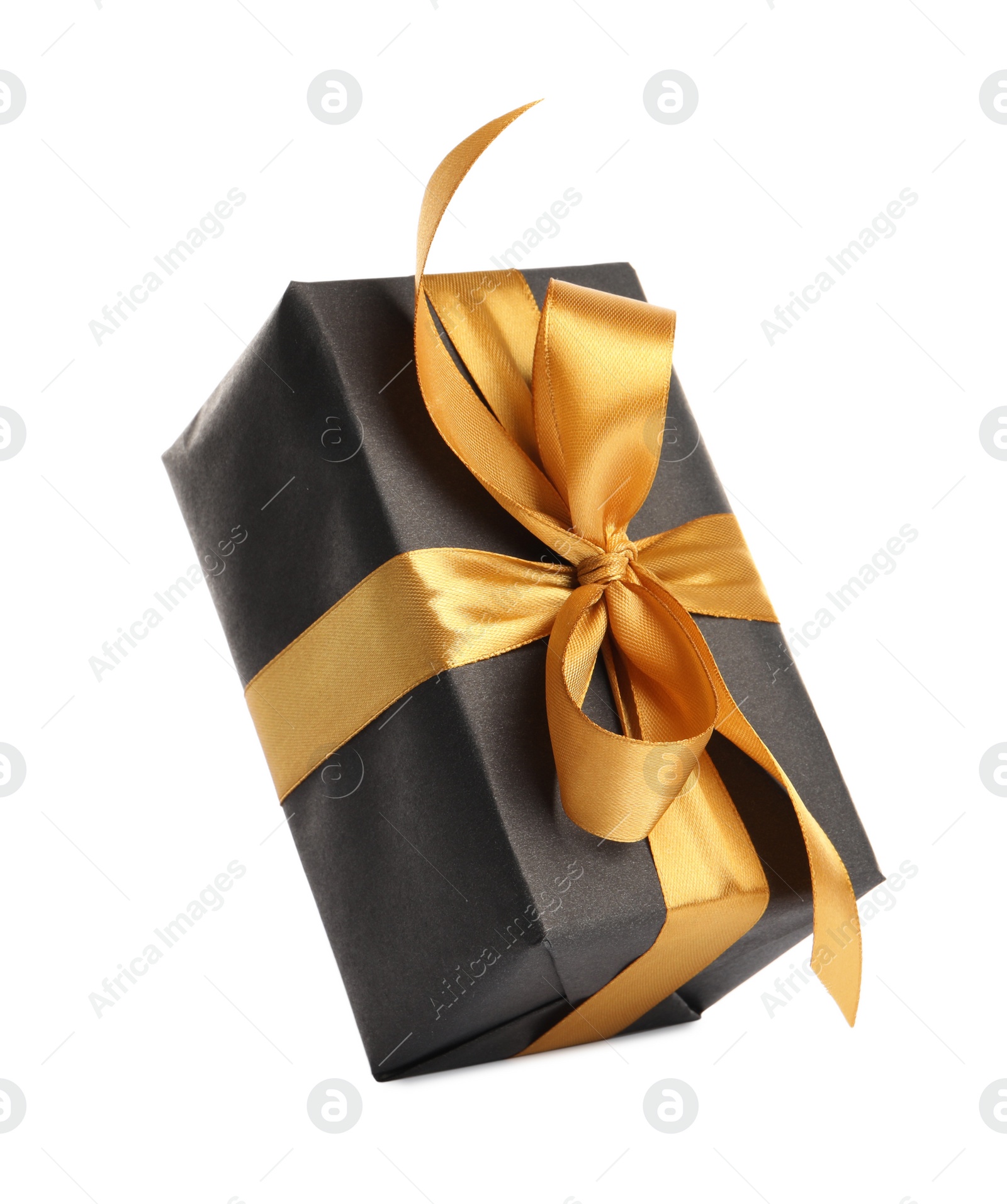 Photo of Beautiful gift box with golden ribbon and bow on white background