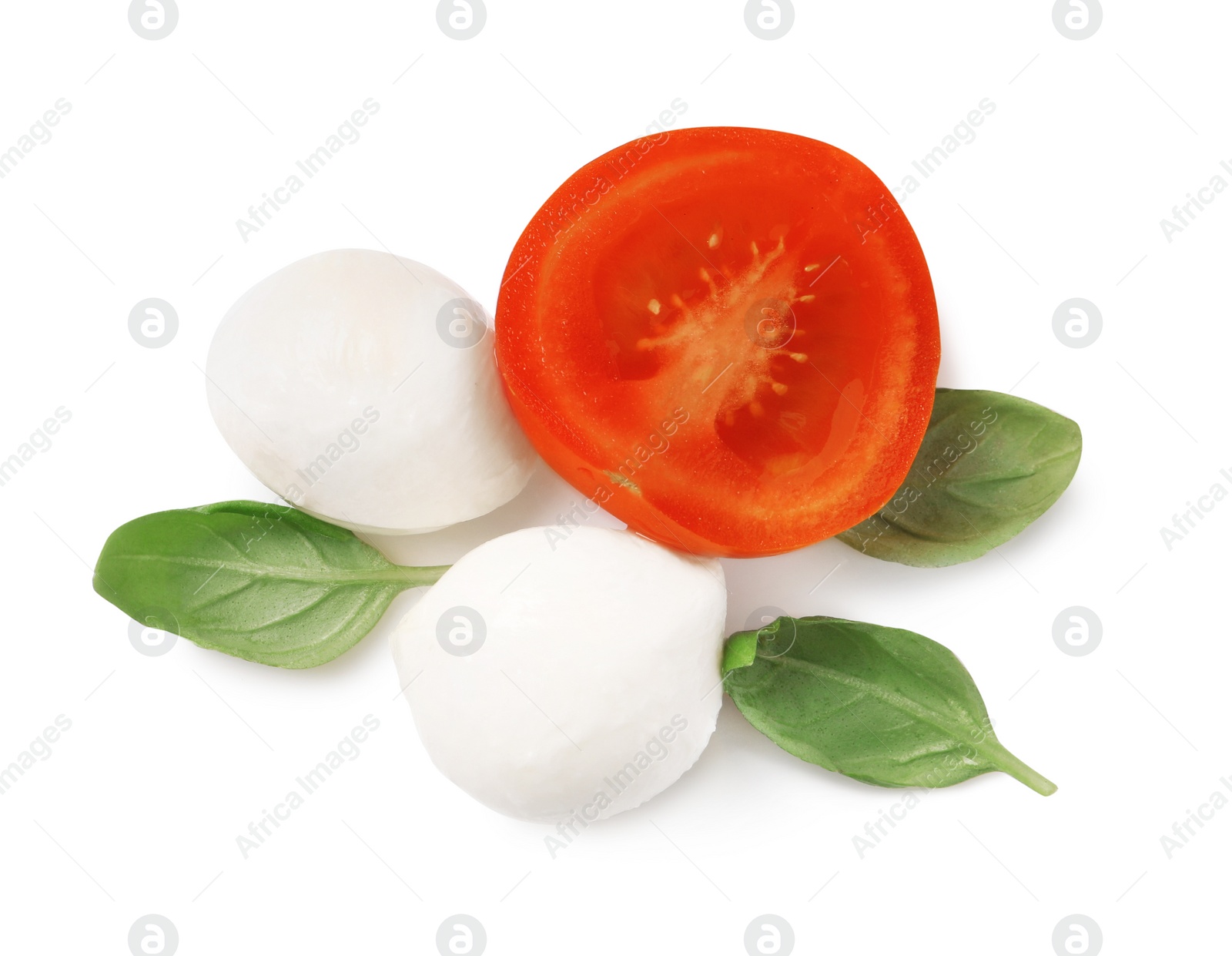 Photo of Delicious mozzarella, tomato and basil leaves on white background, top view