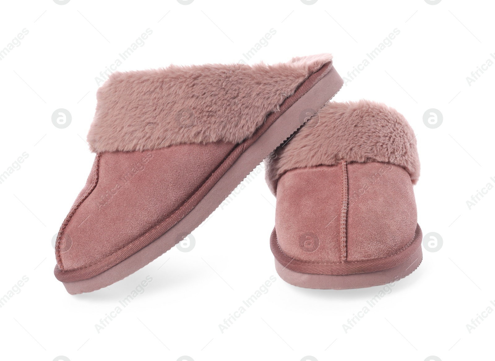 Photo of Pair of pink soft slippers isolated on white