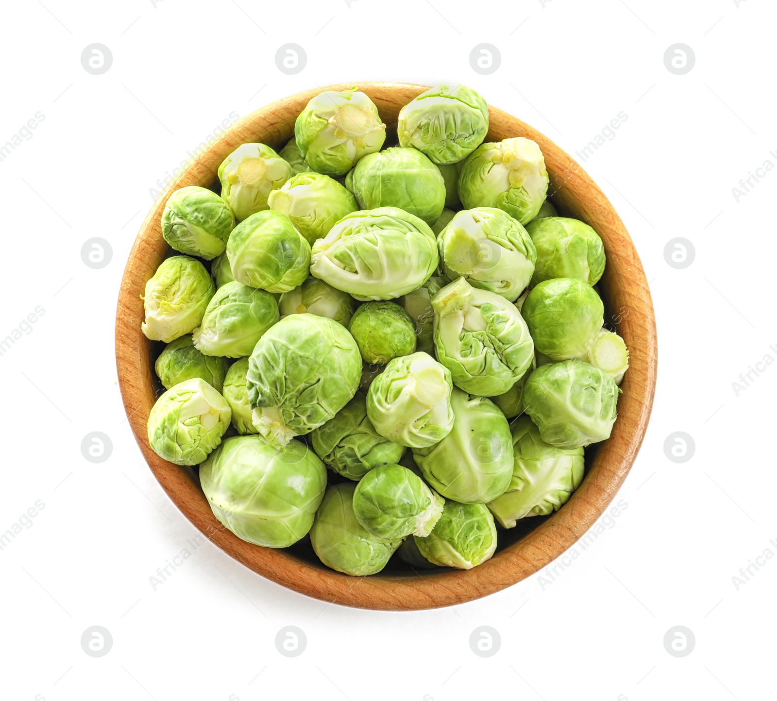 Photo of Bowl of fresh Brussels sprouts isolated on white, top view