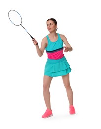 Young woman playing badminton with racket on white background