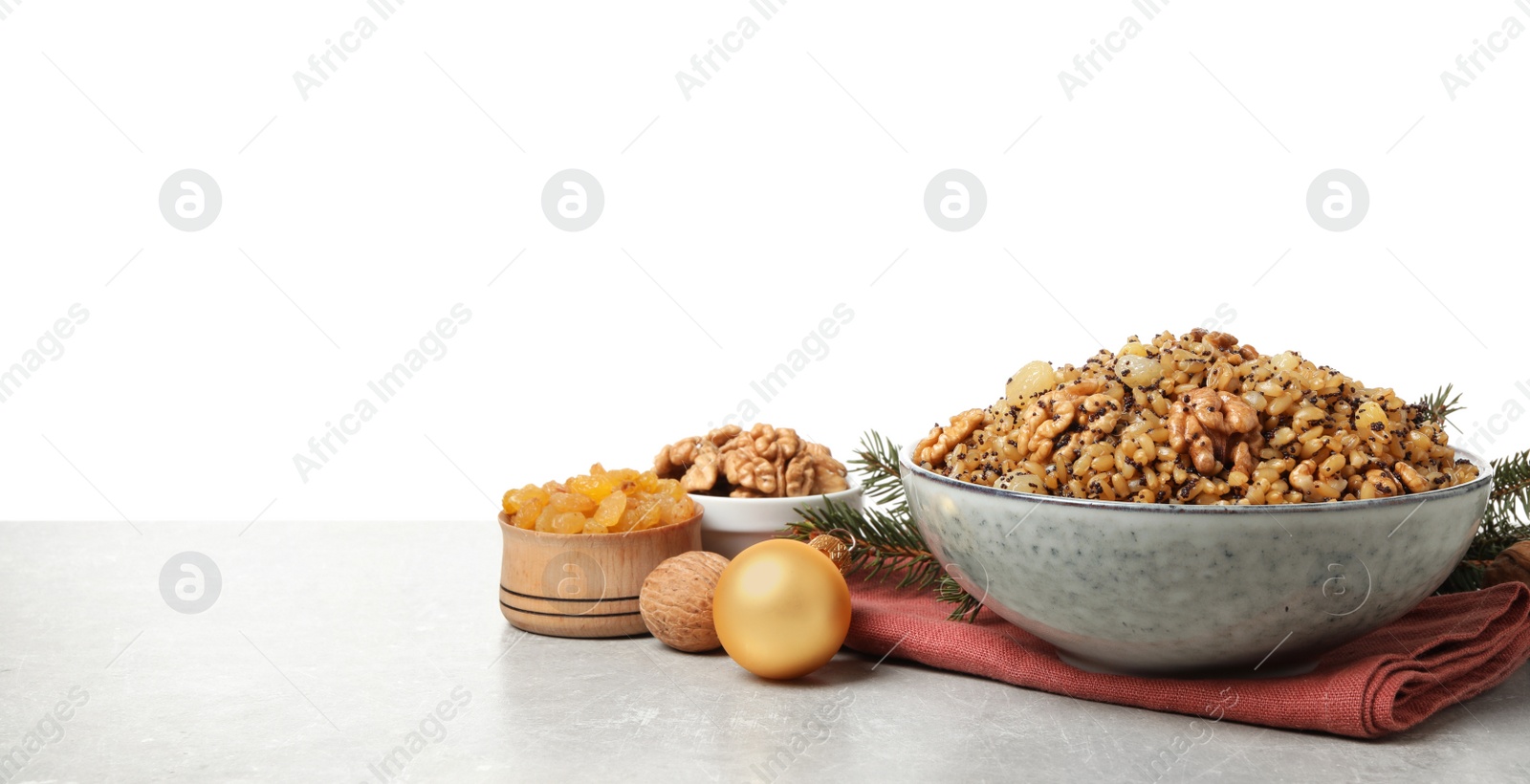 Photo of Traditional Christmas slavic dish kutia on light grey table against white background. Space for text