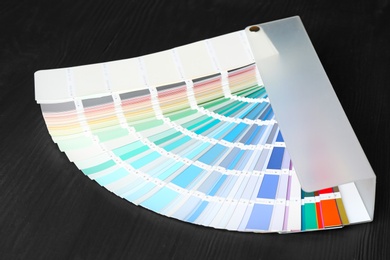 Photo of Color palette samples on black background