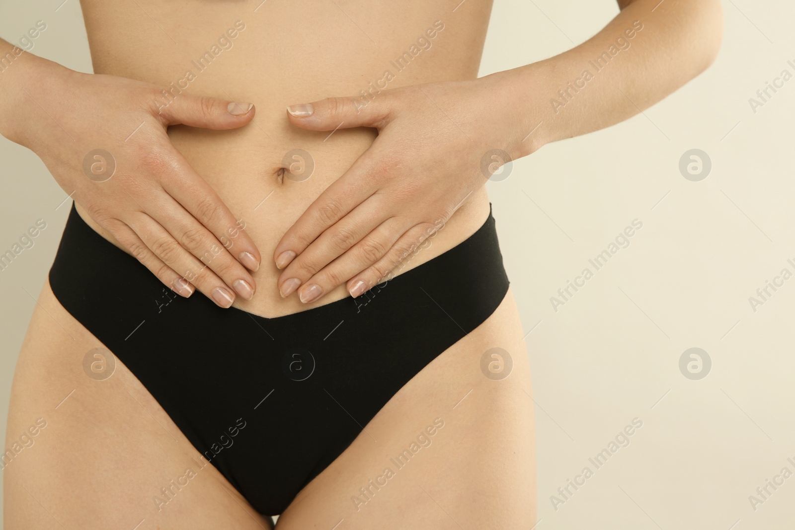 Photo of Gynecology. Woman in underwear on light background, closeup