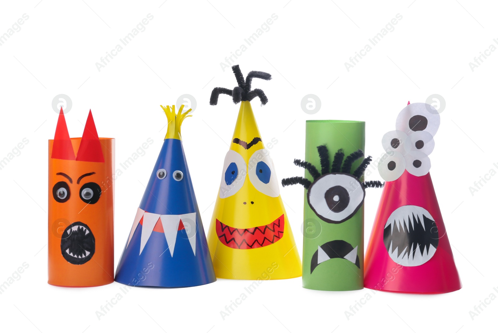 Photo of Funny monsters on white background. Halloween decoration