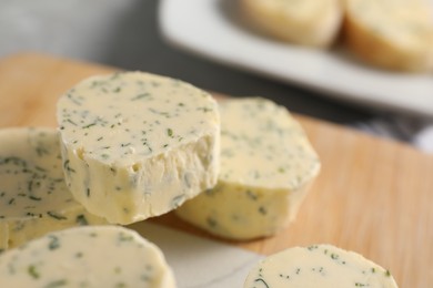 Photo of Tasty butter with dill on table, closeup