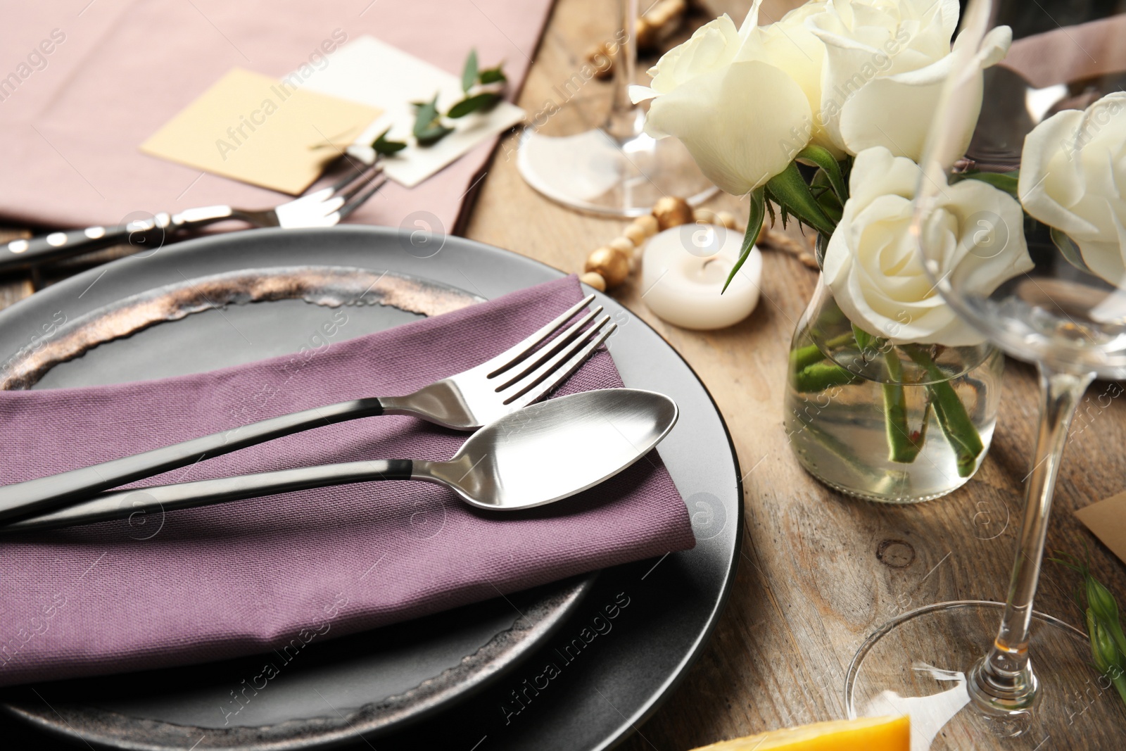 Photo of Elegant festive table setting on wooden background