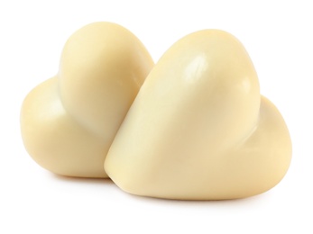 Photo of Beautiful heart shaped chocolate candies on white background