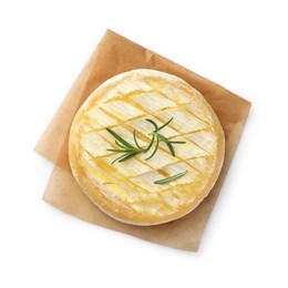 Photo of Tasty baked brie cheese with rosemary isolated on white, top view