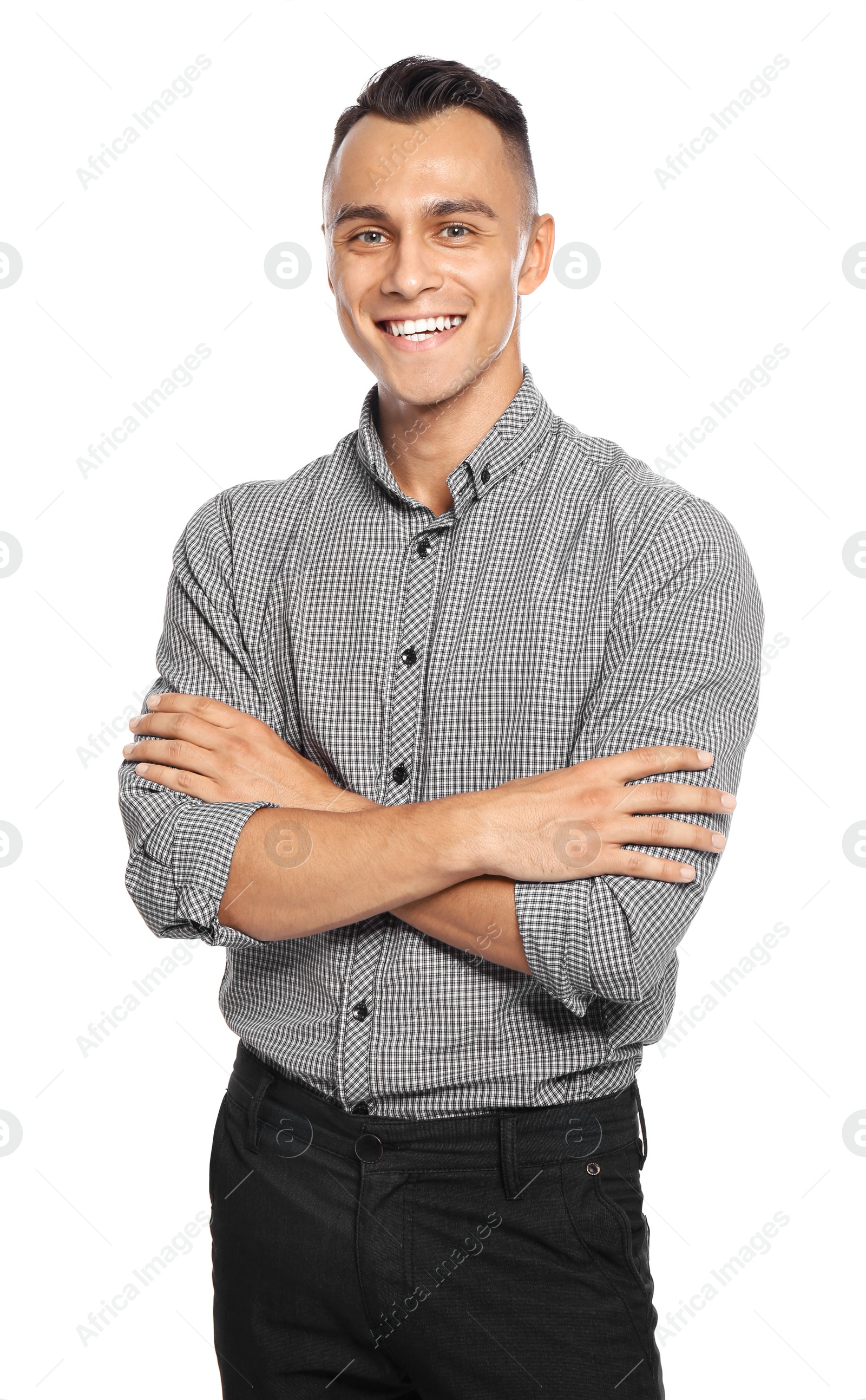 Photo of Young man in casual clothes posing on white background