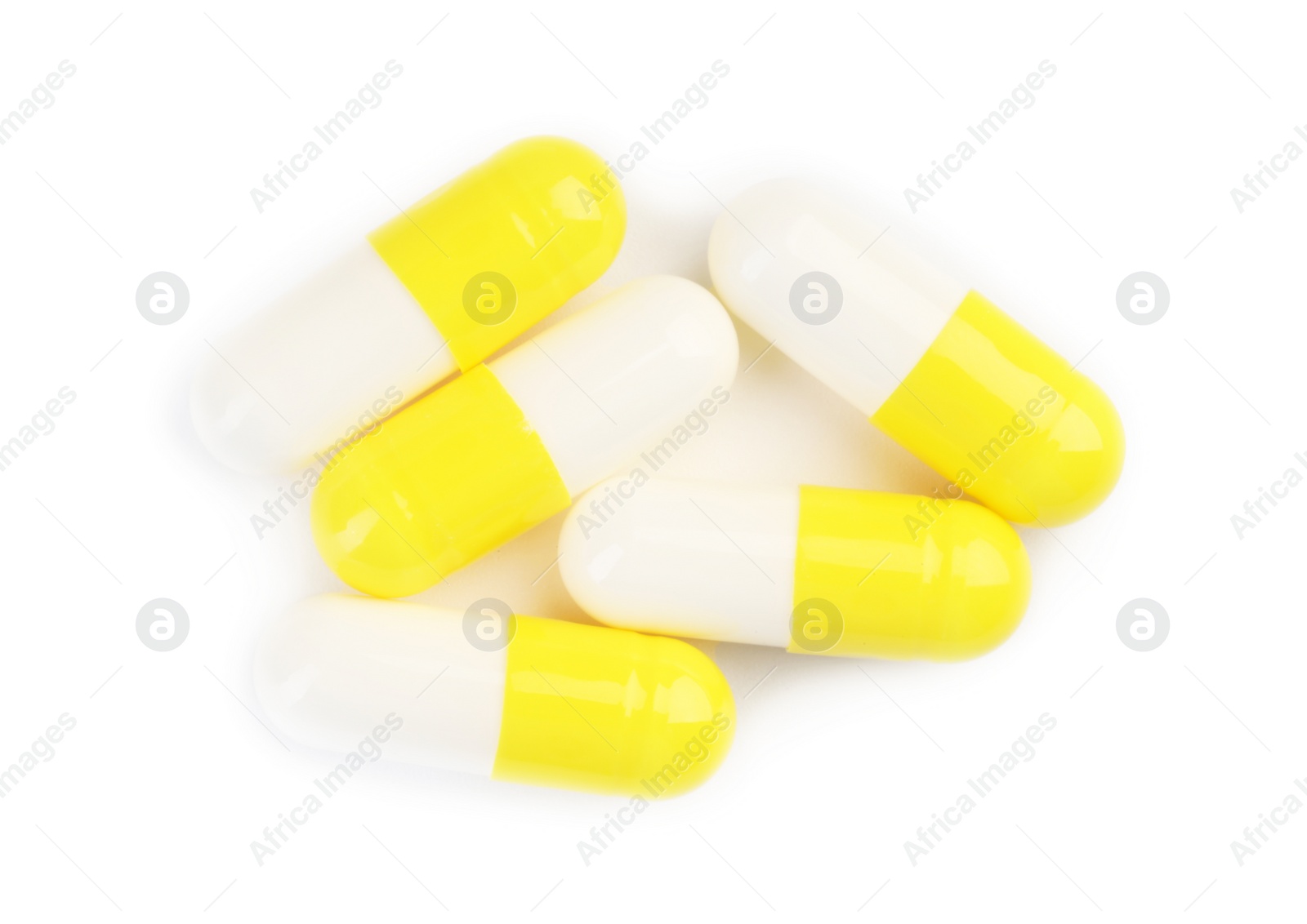 Photo of Many antibiotic pills isolated on white, top view