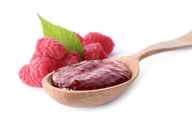 Photo of Delicious jam and fresh raspberries in wooden spoon on white background