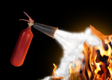 Image of Putting out flame with fire extinguisher on dark background