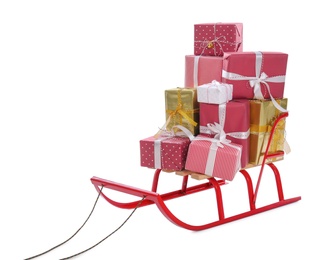 Sleigh with gift boxes on white background