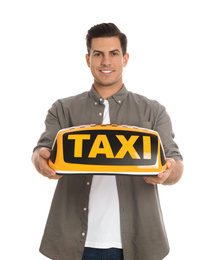 Photo of Man holding taxi sign on white background