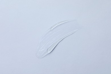 Photo of Swatch of cosmetic gel on white background, top view