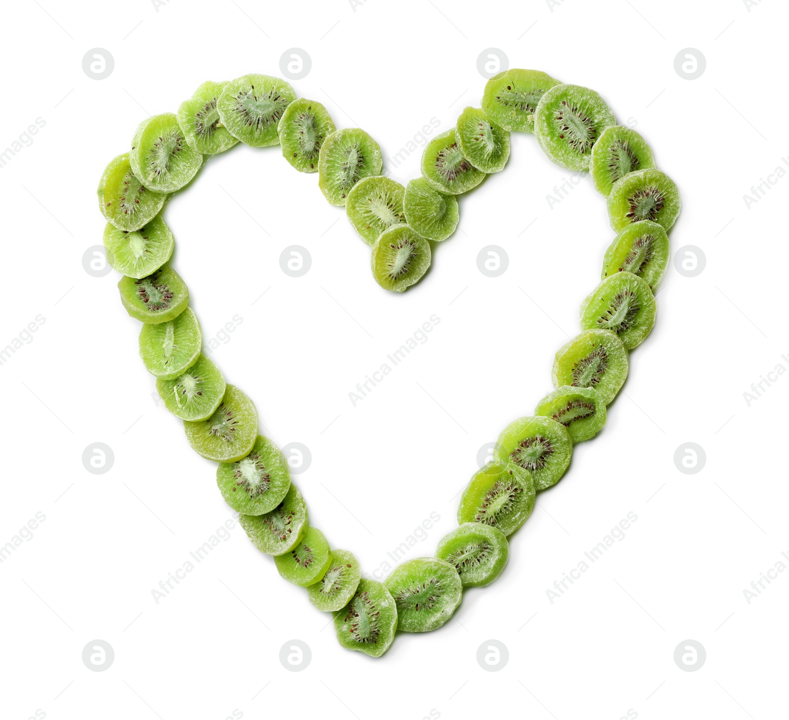 Photo of Heart shaped frame made of kiwi on white background, flat lay. Dried fruit as healthy food