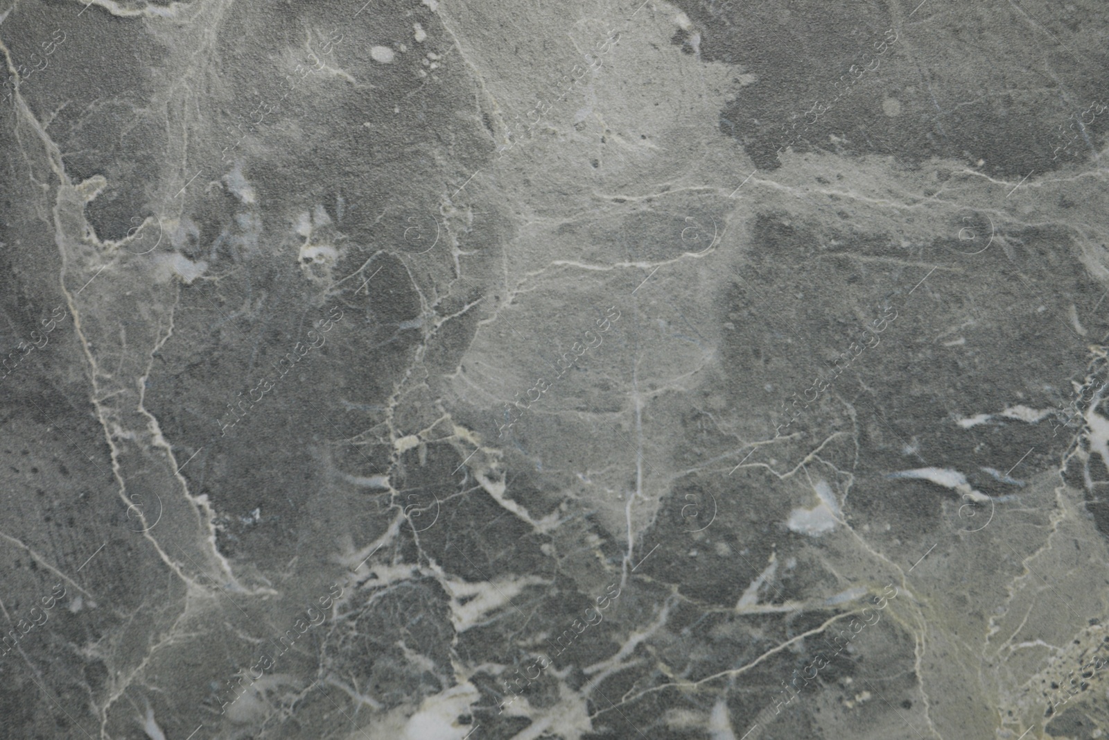 Photo of Texture of grey marble surface as background, closeup