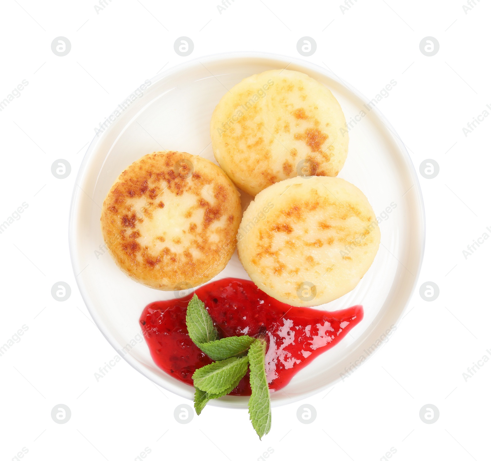 Photo of Delicious cottage cheese pancakes with jam and mint isolated on white, top view