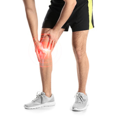 Man suffering from knee pain on white background, closeup