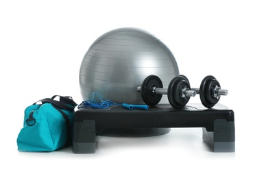 Set of fitness equipment on white background