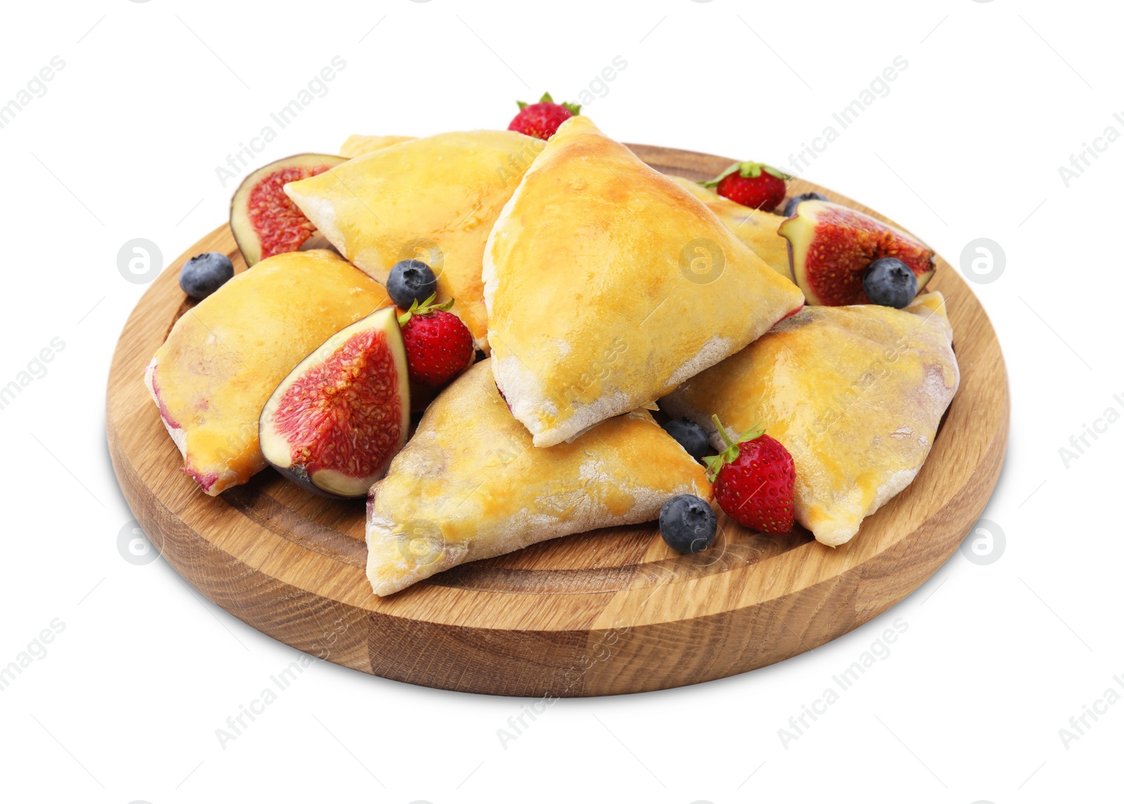 Photo of Delicious samosas with figs and berries isolated on white