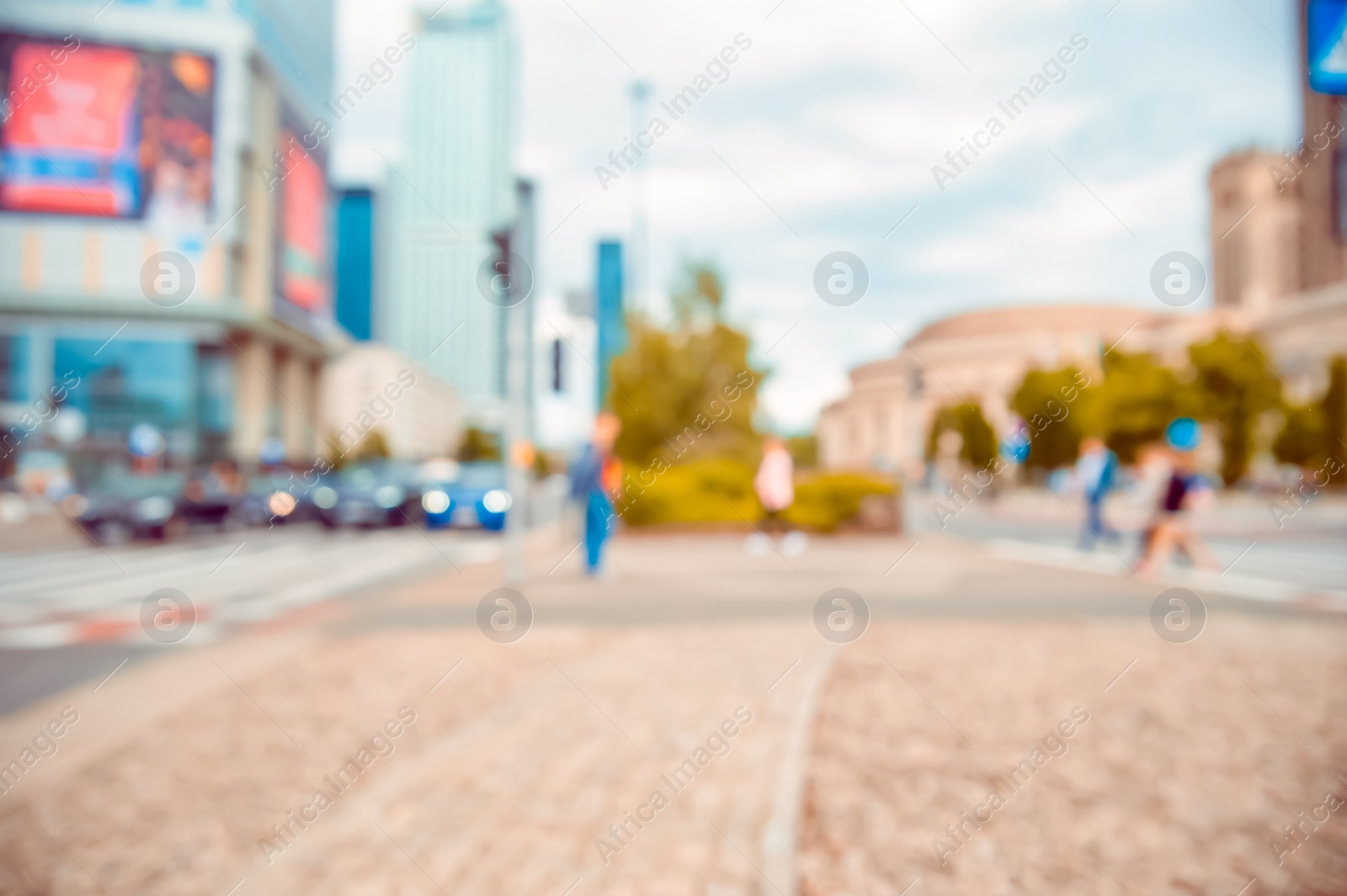 Photo of People walking on city street, blurred view