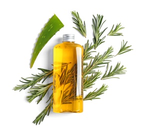 Photo of Bottle with essential oil and fresh herbs on white background