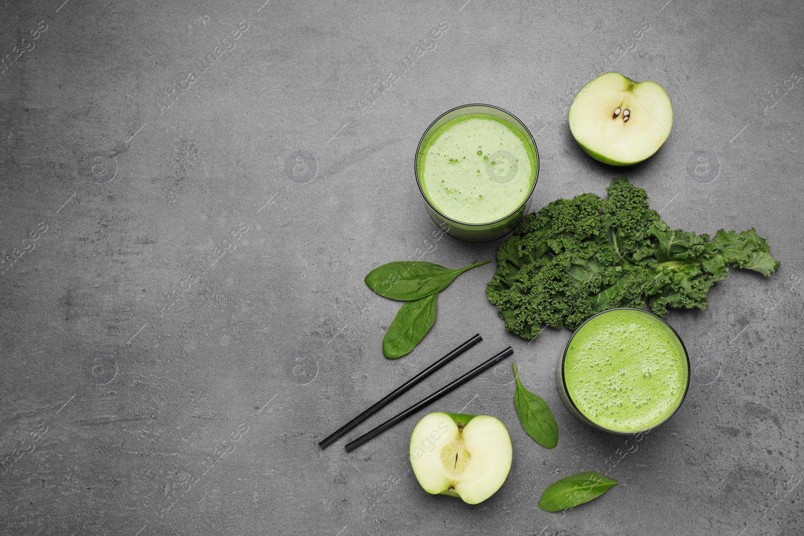 Photo of Flat lay composition with kale smoothie on grey table, space for text