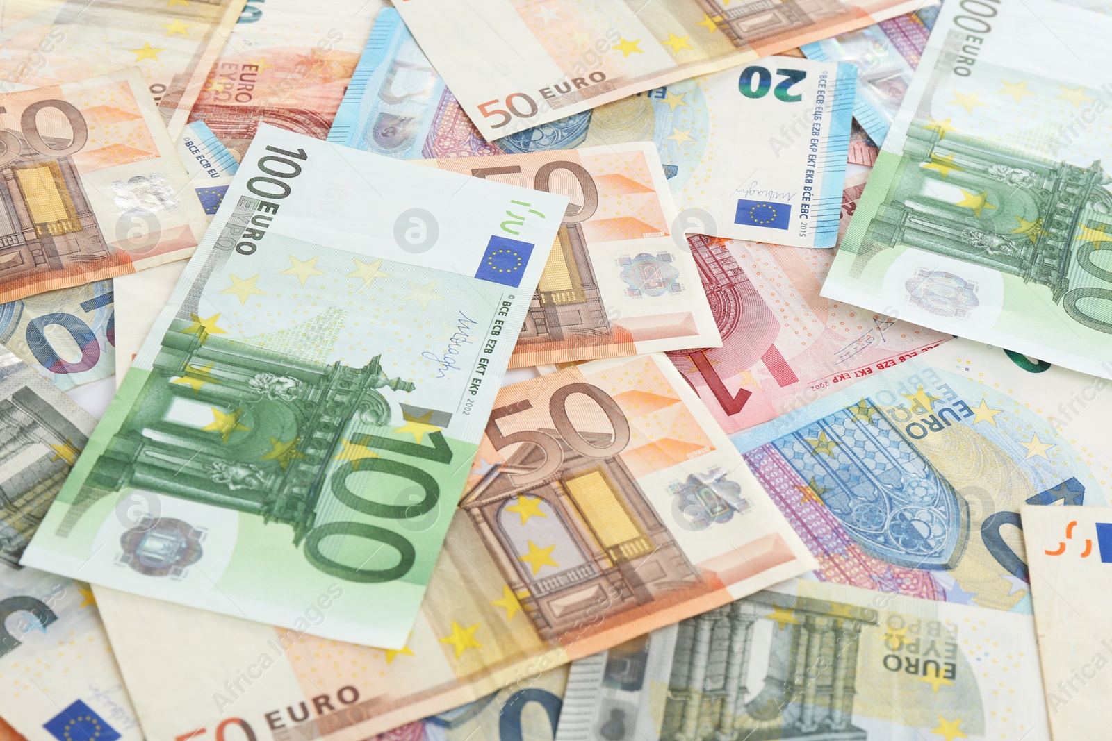 Photo of Euro banknotes as background, closeup. Money and finance