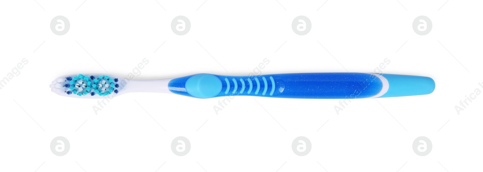 Photo of One blue plastic toothbrush isolated on white, top view