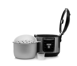 Photo of Modern electric multi cooker, parts and accessories on white background